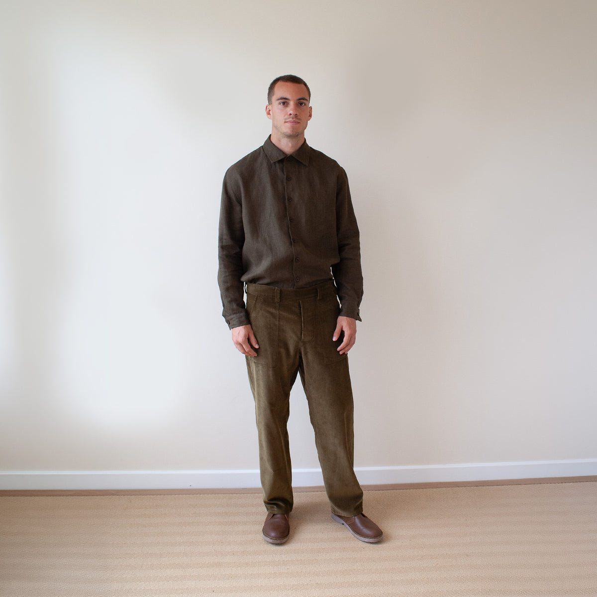 Side button trousers in olive cord