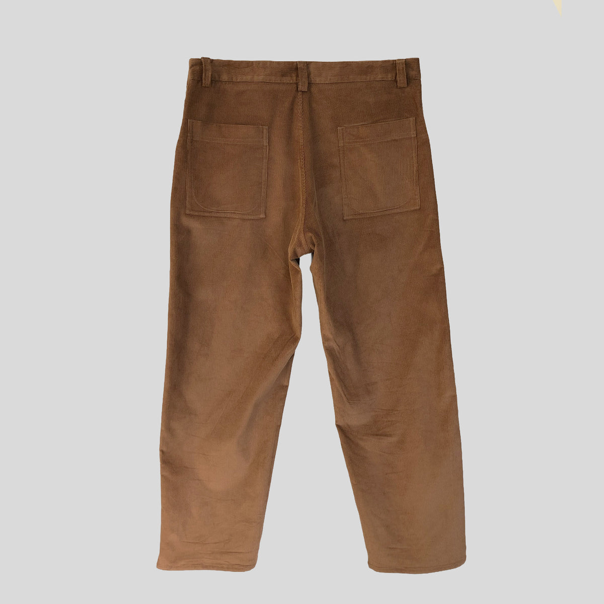 Side button trousers in medium cord