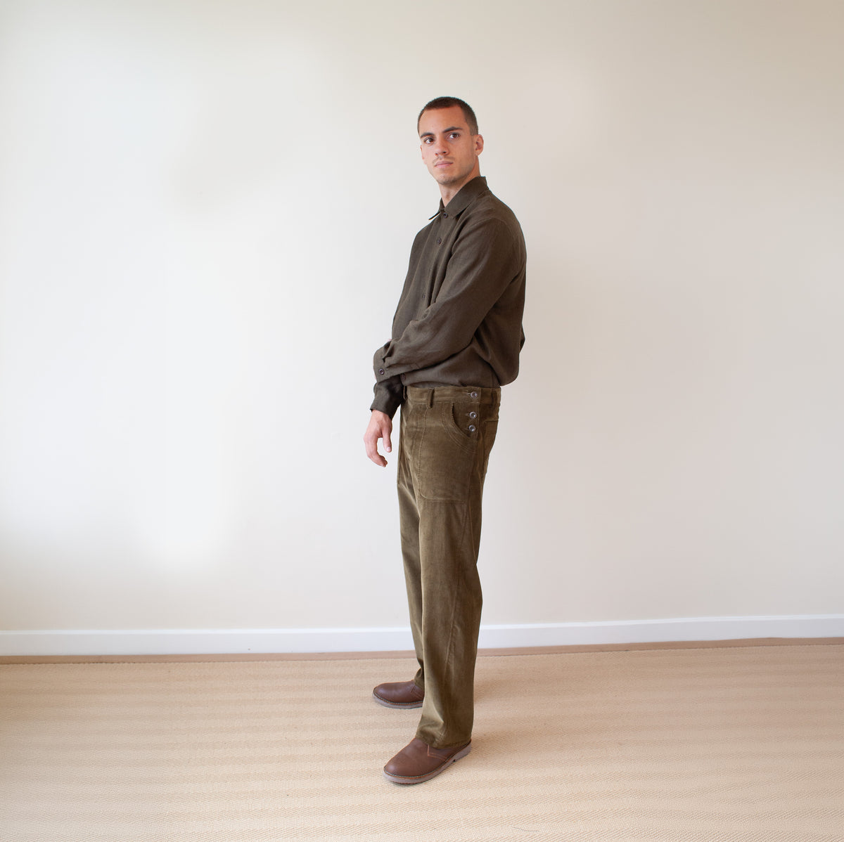 Side button trousers in olive cord
