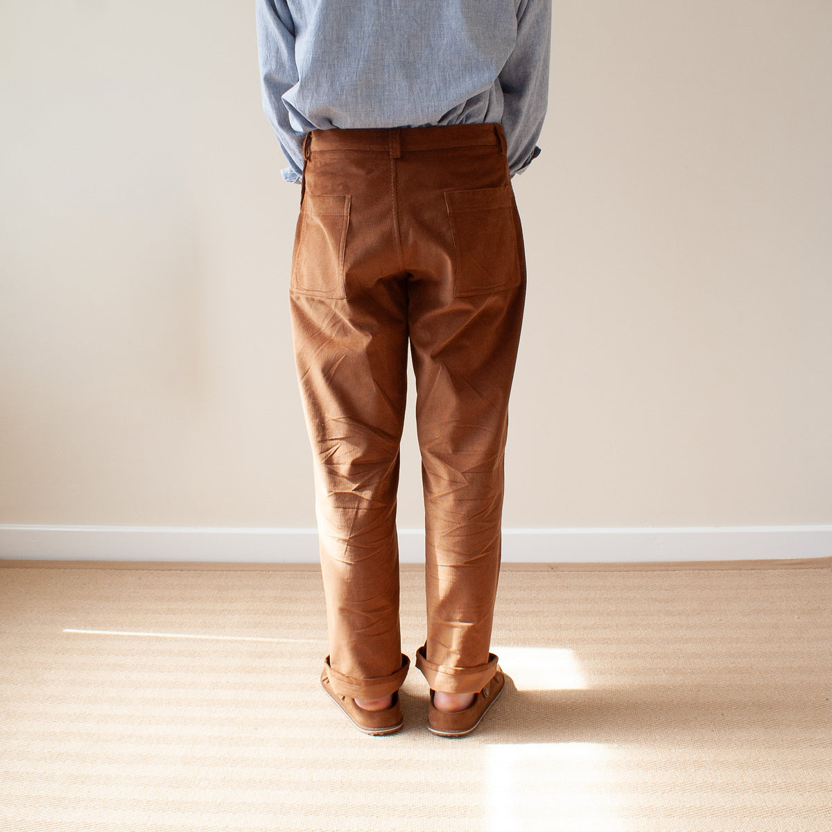 Side button trousers in medium cord
