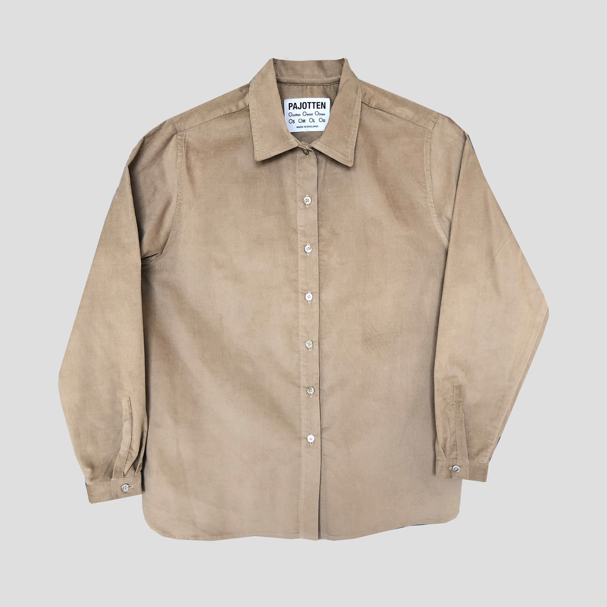 A light brown corduroy button-up shirt by Parotten, laid flat against a neutral gray background.